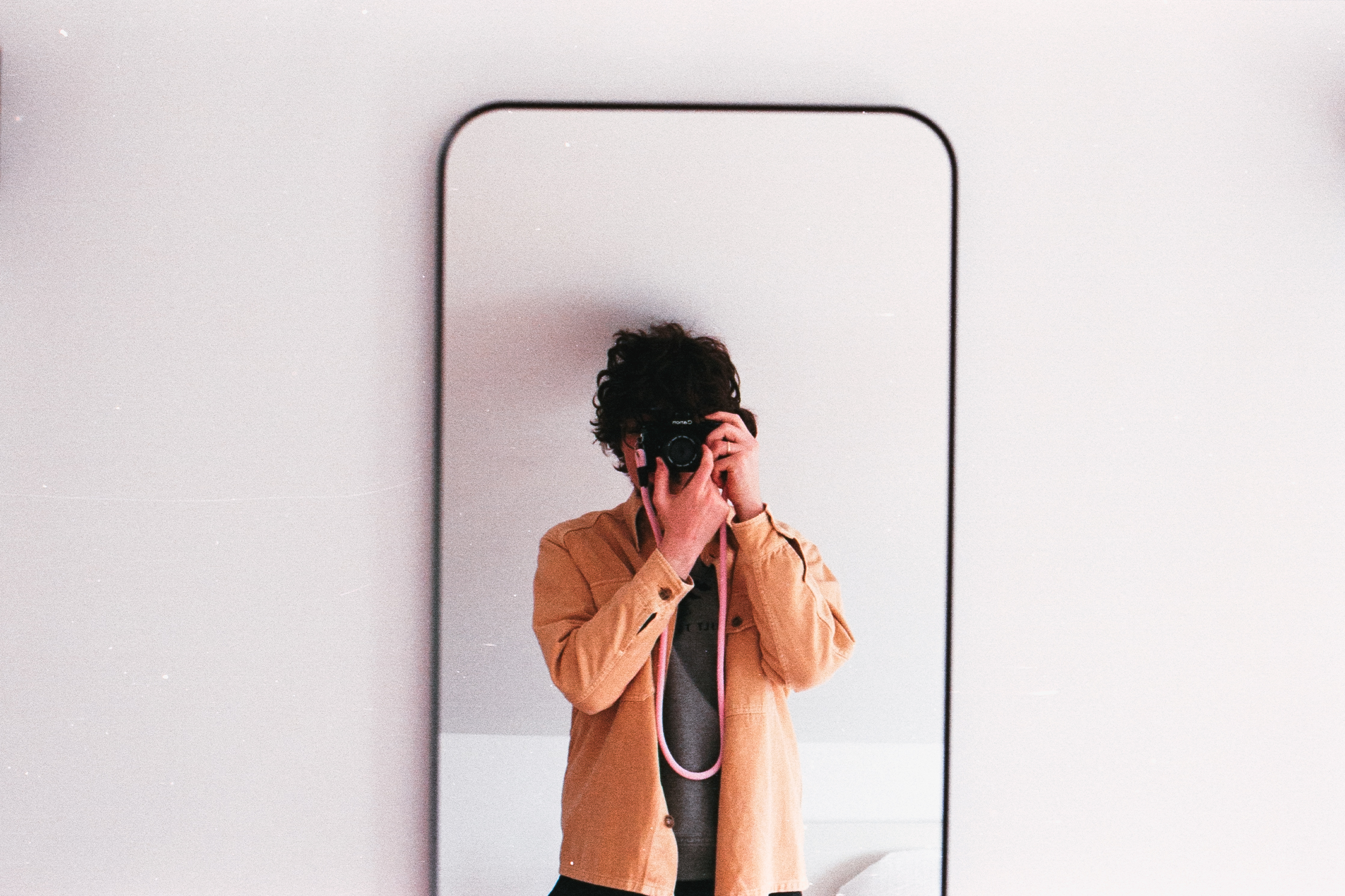 Self-portrait with a film camera
